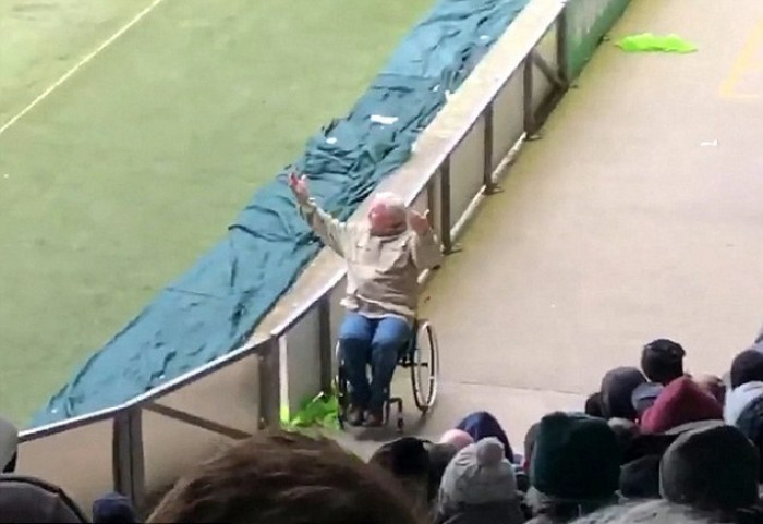 Hilarious Moment! Enthusiastic Football Fan Cheered his Team & Jumps Out-of-Wheelchair