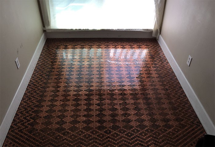 Woman Renovates Old Floor Using 13,000 Pennies